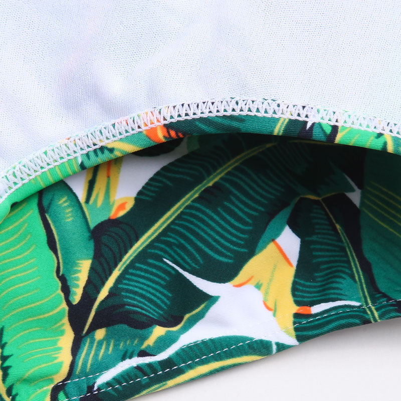 Green leaf seaside sexy triangle swim trunks for men